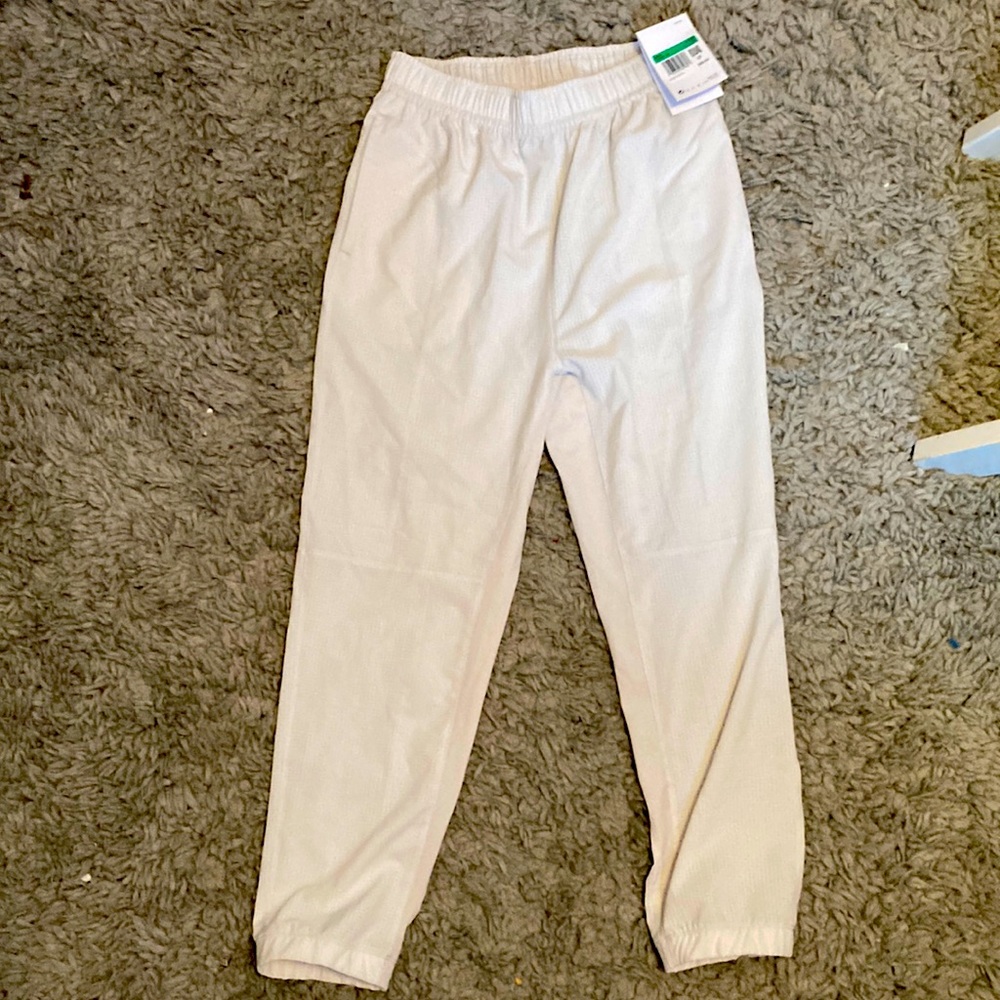 NWT!! Cream colored Nike Tech Pack sweatpants, super cute! Size youth X-Large!!!